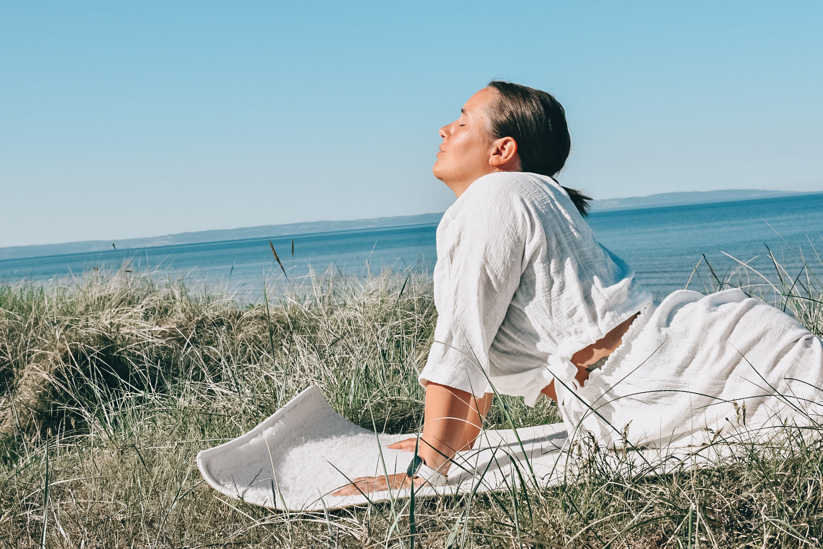 30 min - Morgonyin på stranden (Inkl guidad Shavasana)