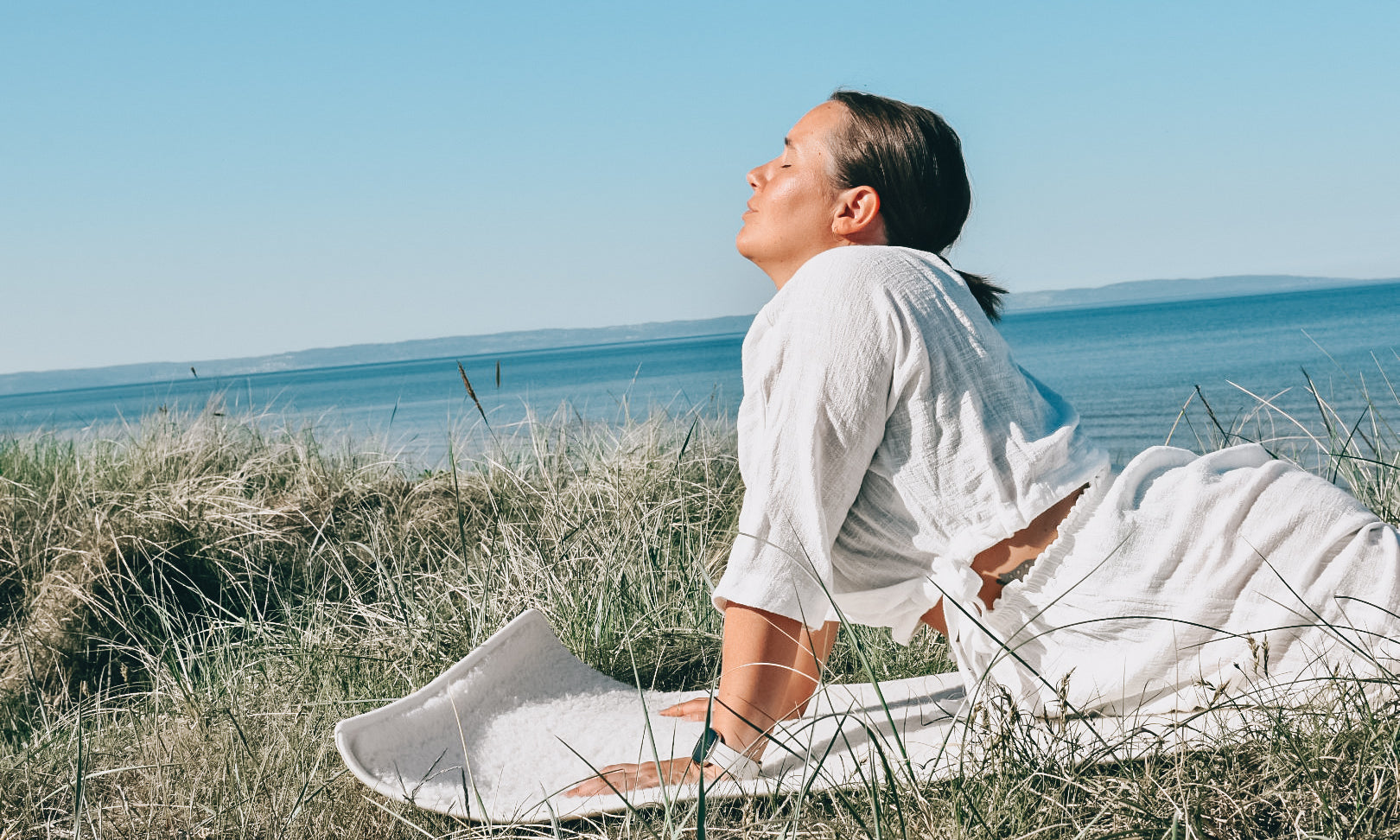 30 min - Morgonyin på stranden (Inkl guidad Shavasana)